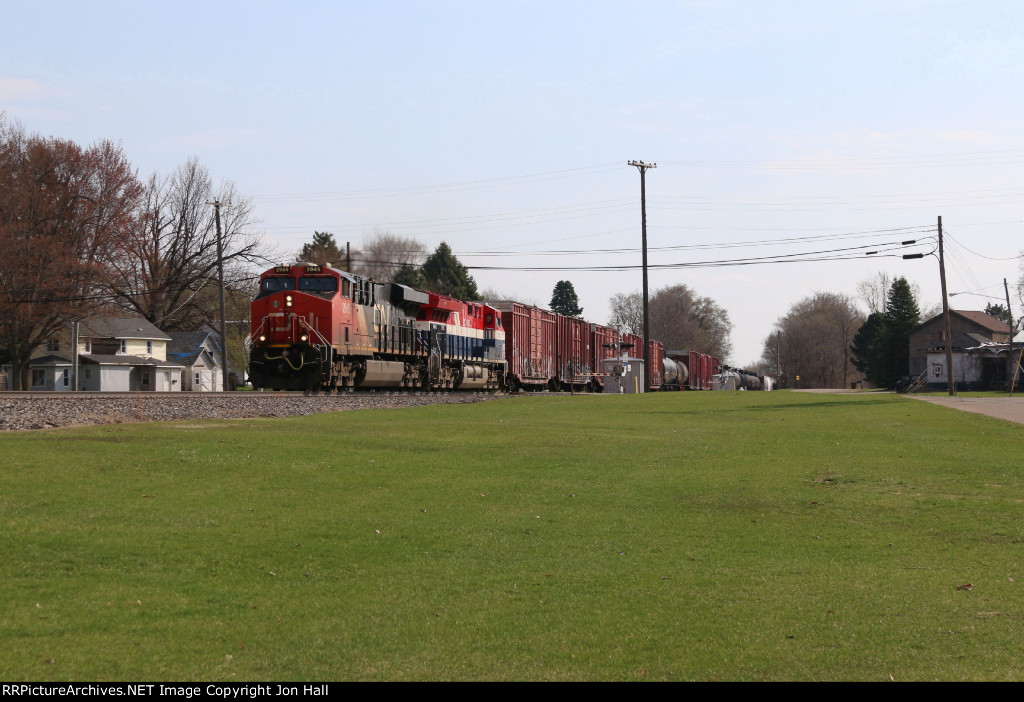 A491 rolls west through Bancroft with the BC Rail heritage unit trailing